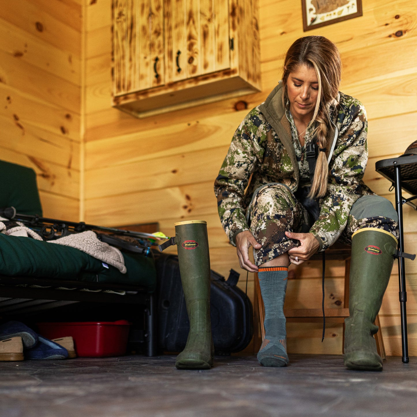 Darn Tough women's  lightweight hunting socks in seafoam on model