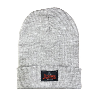 Johnson Woolen Mills beanie in Alabaster heather with black label on cuff